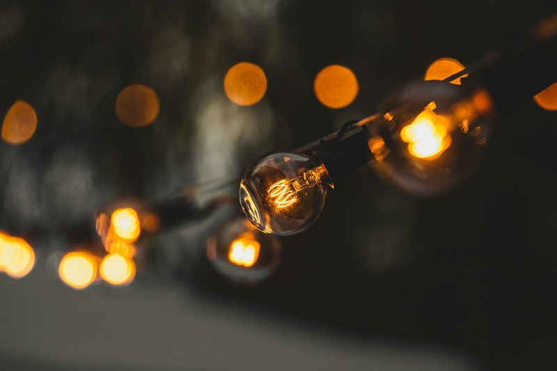 A close up of commercial grade LED bulbs on a strand